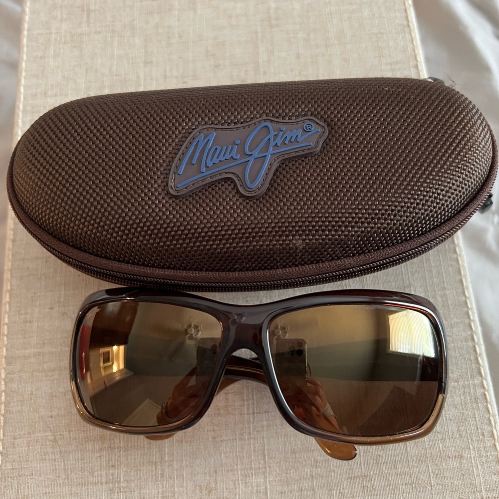 Maui Jim square tortoise sunglasses. One lens was replaced by Maui Jim.